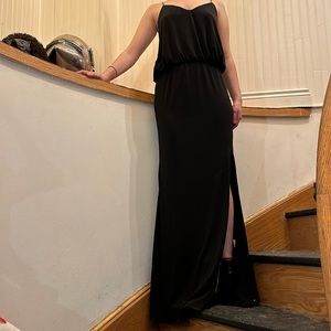 Black full length dress sz M gold chain strap with crystal accents, side slit.